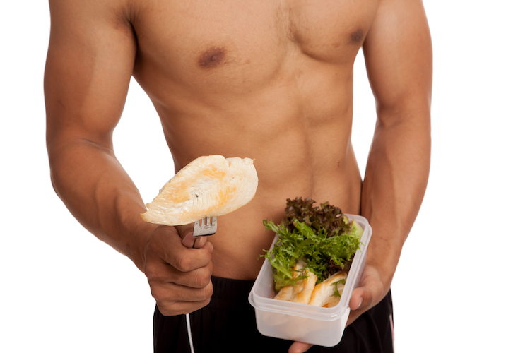 strong,muscular,asian,man,with,clean,food,isolated,on,white